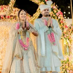 A moment of gratitude and joy. The bride's natural, radiant makeup is perfect for her daytime wedding ceremony with her groom.