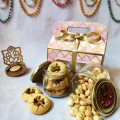 If you prefer something savory and traditional, this two-jar hamper is a great option. It contains my ghee-based pistachio nankhatai and roasted peri peri makhana, perfect for festive snacking.