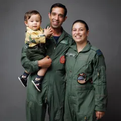 The complete family of pilots, smiling together for a classic portrait. Capturing their bond and shared profession was a true privilege.