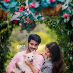 A duplicate of the previous image, showcasing a beautiful portrait of a couple with their pet.