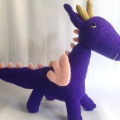 If you can dream it, I can crochet it. This custom purple dragon was a special request from a client, and I loved bringing this magical creature to life, stitch by stitch. I can create personalized amigurumi toys in your favorite colors and designs.