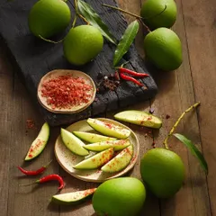This image brings back so many memories. My goal with this food styling was to create a sensory experience, highlighting the contrast between the tart green mango and the spicy red masala. It’s a great example of telling a story with food.