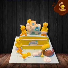 Celebrating a half-birthday is a fun milestone. This cake is themed around a baby in a bathtub full of bubbles, surrounded by adorable rubber ducks, perfect for marking six months of joy.