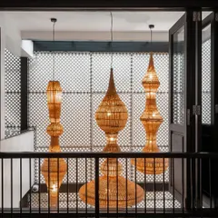 These large, sculptural pendant lights are made from cane by our collaborators at Bamboopecker. They serve as a stunning focal point in a double-height space, showcasing the beauty of natural, sustainable materials.