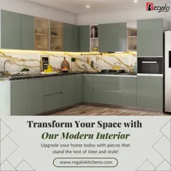 We transformed this space with a modern L-shaped kitchen in a calming sage green. The marble-patterned backsplash adds a touch of luxury, while the layout maximizes storage and counter space, complete with an integrated oven.