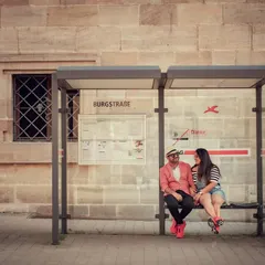 Capturing a quiet moment at a bus stop in Germany. We are available for destination shoots across the globe, turning your travel adventures into beautiful pre-wedding memories.