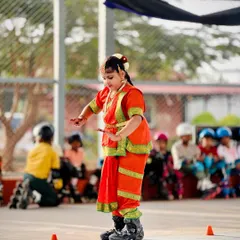 The grace and balance required for this performance are immense. This skater demonstrates incredible skill, holding a classical dance pose while balancing perfectly on her skates.