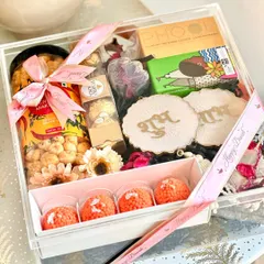 Make this Diwali unforgettable with our premium acrylic trunk hamper. It’s filled with festive joy, including four ladoo-shaped candles, traditional Shubh Labh hangings, Phool incense cones, and tasty makhana snacks for the perfect celebration.