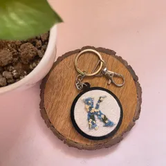 A hand-embroidered initial keychain with a floral 'K'. These make for such cute, personal, and affordable gifts.