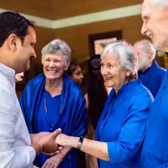 A moment of warm, heartfelt connection between devotees and our visiting Nayaswamis. Divine friendship is the cornerstone of our community, where we see and honor the Divine in one another.