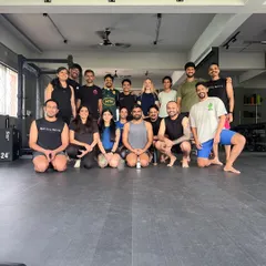 The Troop HQ community celebrating our one-year anniversary after a challenging mobility workshop. This space has become a second home for so many of us.