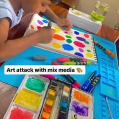 See the magic of process art in action. With my kits, there are no rules, just pure exploration. This little artist is using a mix of watercolors and crayons to create his own world of dots, building confidence and telling his own story with every color he chooses.