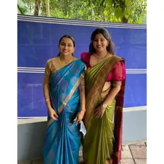 Twinning in style. This mother and daughter are wearing custom blouses I designed to match their beautiful silk sarees for a family function.
