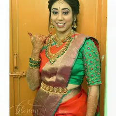 My friend was all set for her engagement with this fun pose. I draped her beautiful orange and green silk saree, ensuring it was comfortable enough for her to be her happy, expressive self.