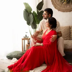 A quiet moment with the whole family, including the furry members. This portrait captures the family looking out the window, a peaceful and candid shot.