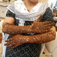 A full back hand bridal design that is dense with detail. I used a combination of hearts, paisleys, and floral elements to create a rich and textured look perfect for a bride.