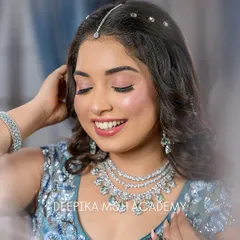 A dreamy, ethereal look in a blue gown, created for our academy portfolio.