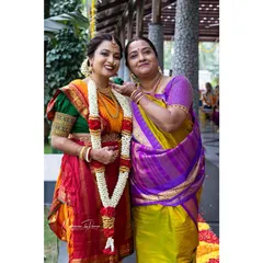 For Ashwini's mother, we did a traditional Iyer Madisar draping. I am experienced in various regional draping styles, ensuring authenticity and comfort for all family members on the wedding day.