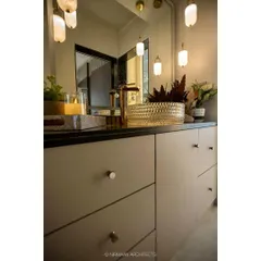 A different angle of the wash area in the Duplex Project, showcasing the beautiful pendant lights that create a luxurious, hotel-like feel in the corridor.