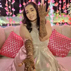Our gorgeous bride looking absolutely radiant on her mehndi night. Her joy is the best reward for the hours spent creating her intricate henna design.