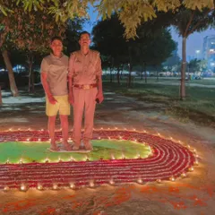 Standing on our unique track rangoli with a student. It was a special way to celebrate the festival of lights.