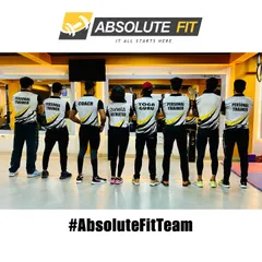 A look at our team from behind, showcasing the different roles we play in your fitness journey. From 'Personal Trainer' to 'Yoga Guru' and 'Zumba Instructor', we have a specialist for every need.