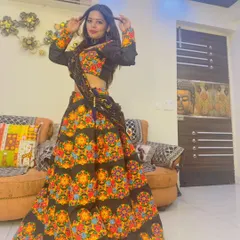 Our happy client looking absolutely stunning in our black chanya choli with vibrant multi-color embroidery, perfect for a Dandiya night.