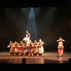 A striking formation from 'Akhandalaya'. The choreography in this piece is designed to create strong visual lines and convey a sense of collective energy and power.