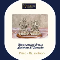 This set of silver-plated brass Lakshmi and Ganesha idols is a perfect gift for a new beginning. They sit on a wooden base, making them a beautiful and auspicious addition to a home temple.