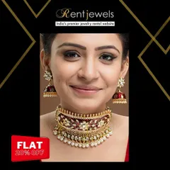 This hand-worked Jadau Kundan choker features rich red enamel and pearl details. It's a perfect statement piece to pair with a red or cream-colored bridal lehenga.