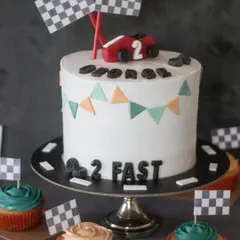I love a fun theme! This "2 Fast" racing cake and matching cupcakes were for a little boy's second birthday. I can create custom designs for any party, from kids' superhero themes to more grown-up celebrations.