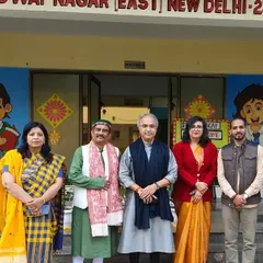 My goal is to bring authentic classical music to young minds. Here I am with the staff at a school after an interactive concert and lecture-demonstration, part of my ongoing outreach efforts to make our heritage accessible to the next generation.
