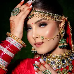 A close-up of the classic, timeless red bridal makeup that every Indian makeup artist must master. I teach you how to create this flawless, radiant glow with bold eyes and a perfect red lip.