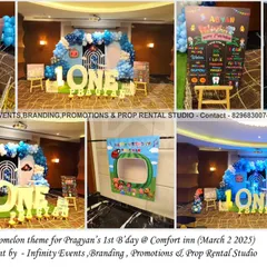 A grand Cocomelon setup for Pragyan's first birthday at Comfort Inn. This party features a large "ONE" table, a custom backdrop with a balloon arch, and a fun photo-booth cutout for guests.