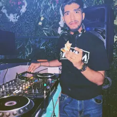 Another shot of me enjoying a snack during a gig. It shows the more relaxed and fun side of being a DJ.