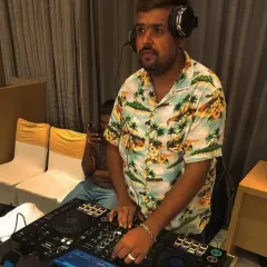 A focused shot of me at the console during a private wedding event at Radisson MIDC. I'm getting ready to transition into the next high energy track.