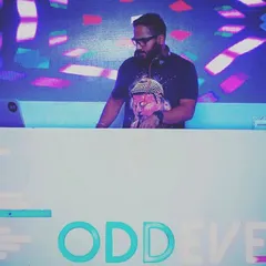 A shot of me performing at an Odd/Even event. The stage setup and visuals are a huge part of creating the right atmosphere for a memorable night.