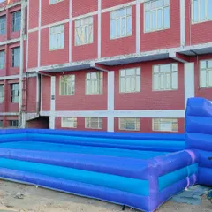 An inflatable pool structure, which can be used for soapy football or as a shallow water play area for kids.