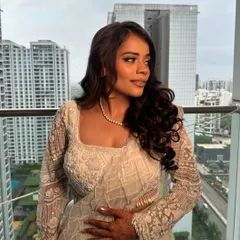 Another angle of this beautiful look. The soft waves and glowing makeup create a timeless style that photographs beautifully.