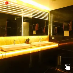 Our wet areas are designed with luxury and hygiene in mind, featuring elegant black marble, modern fixtures, and ambient lighting for a premium experience.