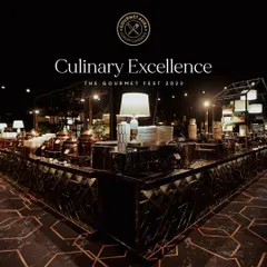 "Culinary Excellence, The Gourmet Fest 2023." A wide shot of our expansive and stylish buffet setup at this prestigious food festival, showcasing our capacity for large-scale, high-profile events.
