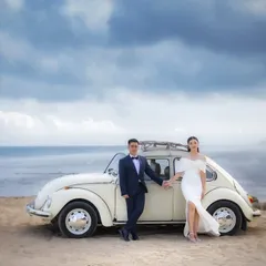 Your story can be a timeless classic. We planned this themed pre-wedding shoot in Bali, complete with a vintage car against the dramatic coastline, to create a narrative of old-school romance and adventure.