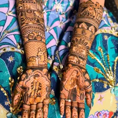 A close-up of a full bridal mehendi design, showcasing the incredible detail that goes into my work. This piece features classic bride and groom figures, a doli (palanquin), and even a deer, telling a complete wedding story on the arms.