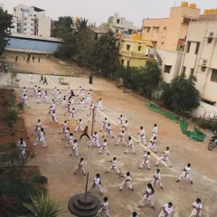 Our Kyokushin family is over 250 strong. Here you can see just a part of our main dojo during an outdoor training session, everyone moving with a single purpose. This is the energy you will feel when you train with us.