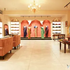 For the 'House of Vaarasa' retail store, we created an elegant and inviting atmosphere to showcase handloom fashion. The design blends traditional Indian arches and a warm color palette with modern track lighting and spacious layouts, reflecting the brand's ethos.