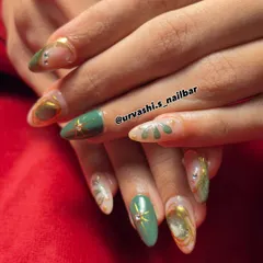 An artistic and elegant set in shades of green and gold. This design features a mix of solid color, abstract patterns, and gold detailing with rhinestone accents for a luxurious finish.