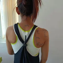 This is what applied learning looks like. A student's back is marked with anatomical landmarks of the scapula, including the superior angle (SA), medial border (MB), and inferior angle (IA), to help visualize muscle attachments and movement patterns.