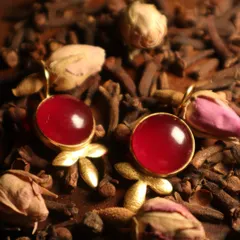 Another view of my red and gold bloom earrings, resting among fragrant cloves and dried roses. A beautiful piece for your Navratri celebrations.