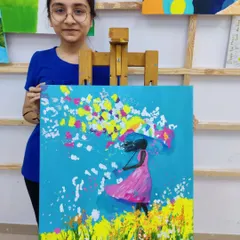 A beautiful and expressive acrylic painting of a girl in a field of flowers, created by one of our teen students. We encourage personal style and emotional expression in our classes.