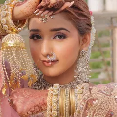This shot showcases the complete bridal look by my student Vishakha. Notice how the makeup complements the heavy jewelry and outfit, a key skill for any professional bridal artist.